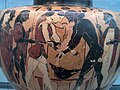 This Greek vase depicts a wrestling match between Peleus and Atalanta in the funerary games of King Pelias. Name inscriptions are written in the alphabet of Chalcis in Euboea. 550 BC.