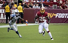 Geathers pursuing Adrian Peterson in a game against the Washington Redskins in 2018. Clayton Geathers 2018.jpg