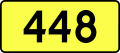 English: Sign of DW 448 with oficial font Drogowskaz and adequate dimensions.