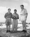 Dean Douglas M Whitaker and Dr Frederick Hase Rodenbaugh, Sr with one of the natives during their inspection of Rongerik Island (DONALDSON 135).jpeg