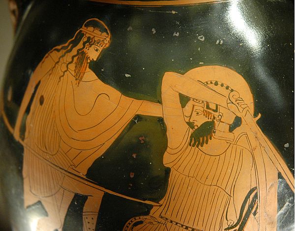 Dionysus (left) with ivy crown, and thyrsus attacking a Giant, Attic red-figure pelike, c. 475–425 BC (Louvre G434).