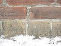 Eroded bricks sw corner of front and frederick, 2013 02 18 -ah.JPG - panoramio.jpg