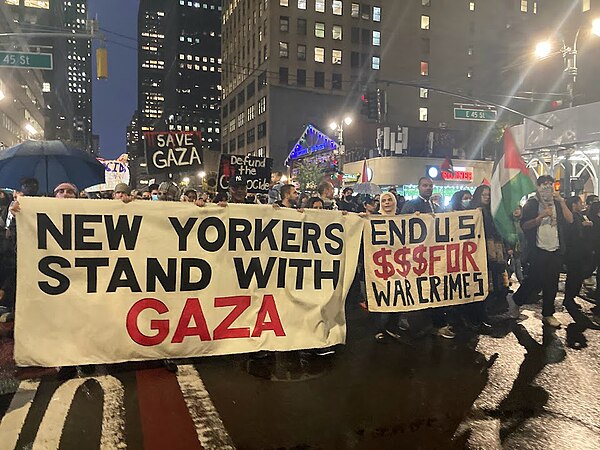 Protestors at a New York City DSA-led protest marches in Manhattan to demand a permanent ceasefire in the Israel–Hamas war, and an end to Israeli apar