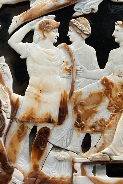 Nero (on the left), saluting Tiberius (seated, on the right) (detail of the Great Cameo of France).