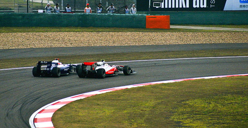 File:Hamilton Barrichello China GP 2010.jpg