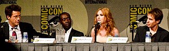 From left: Robert Downey Jr., Don Cheadle, Scarlett Johansson, and Rockwell at the 2009 San Diego Comic-Con International Iron man 2 cast comic con.jpg