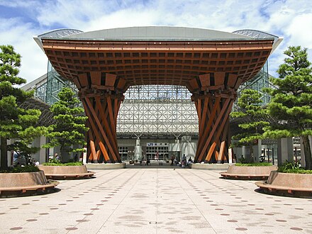 Wooden Tsuzumi Gate and glass facade of Kanazawa Station