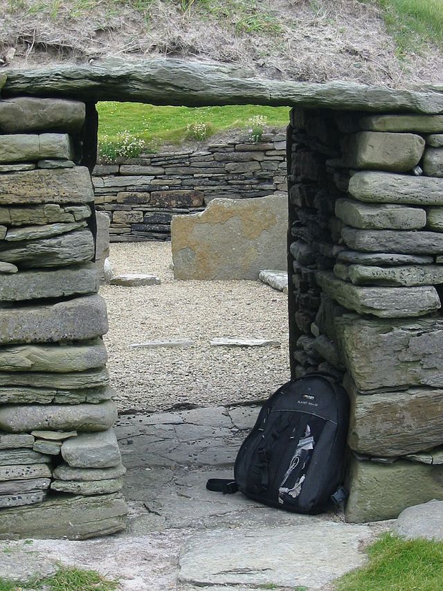 The low entrance doorway into the main house,