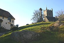 View of Lustleigh Church, the Celtic Cross and Primrose Tea Rooms from Wreyland