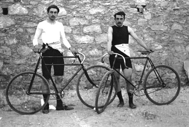Cycle-racing has a long history: French cyclists Léon Flameng and Paul Masson at the 1896 Summer Olympics.