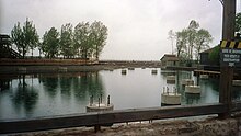 Maverick's footings dot the former Swan Boat pond. Photo taken May 13, 2006 Maverick footers.jpg