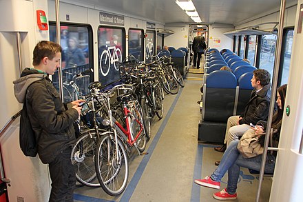 Travelers require a reservation to carry a bicycle onto a train. Carriages carrying bicycles have a large bike symbol on the side of the side of the carriage.