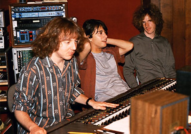 Mitch Easter (near left) was R.E.M.'s producer until 1984, helping to define the band's early sound.