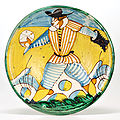 Piatto denominato "Arlecchino" con la rappresentazione di un giocatore di pallone. Montelupo Fiorentino, XVII secolo.