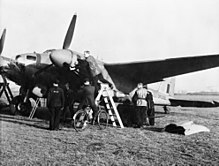 A Mosquito of 105 Squadron is readied for the raid Mosquito being prepared for raid.jpg