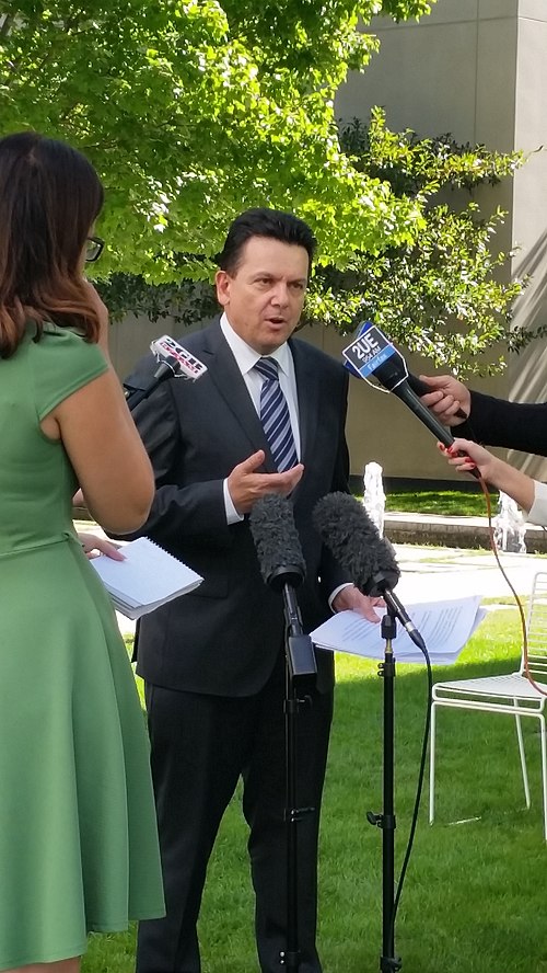 Xenophon speaks to the media in a courtyard of Parliament House, Canberra.