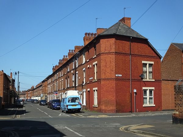 Three storey terraced housing on Wilford Crescent East showing common roof profile