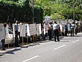 Members holding placards & banners during the demonstration