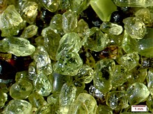 Grains of Earth olivine, one of the minerals MicroOmega is designed to detect Papakolea Beach sand high mag 052915.jpg