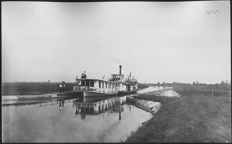 File:Photograph with caption "Steamer 'Marion' with 'Rambler' in tow at Aqueduct 4. Sept. 24, 1908." - NARA - 282345.jpg