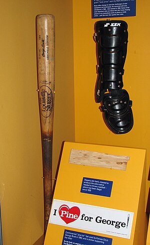 George Brett's pine-tar bat, along with Mark McGwire's body armor Pine-tar bat.jpg