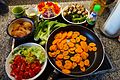 * Nomination Preparing a vegetable stir-fry Asian way with chicken. -- Benreis 15:37, 9 March 2017 (UTC) * Decline  Oppose Beautiful colors and looks tasty, but the composition isn't good (bottom crop, various distracting objects at the background). --C messier 12:36, 9 March 2017 (UTC)