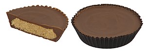 Reese's Peanut Butter Cups, one with wrapper a...