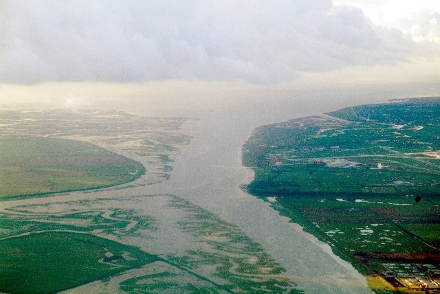 Ribble estuary, looking west, separating the West Lancashire Coastal Plain (left) from the Fylde (right)