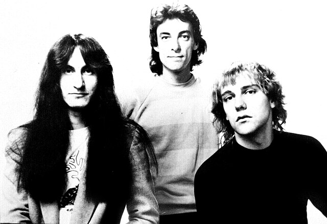 Promotional image of the band in 1981 (left to right): Geddy Lee, Neil Peart and Alex Lifeson