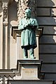 Deutsch: Bronzeplastik Hermann Baumeister von Georges Morin am Ziviljustizgebäude in Hamburg-Neustadt. This is a photograph of an architectural monument. It is on the list of cultural monuments of Hamburg, no. 12260.