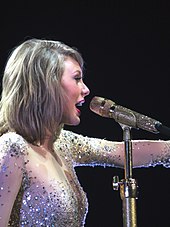 Taylor Swift's 2014 studio album, 1989, was 2015's best performing album on the Billboard 200. It returned to the number one spot on the chart for six weeks in early 2015, accumulating 11 total weeks at number one. Taylor Swift 16 (18912313709).jpg