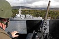 137: US Navy 101003-N-5324W-024 Gunner's Mate 2nd Class Scott Wegmann stands watch at the .50-caliber machine gun mount aboard USS Stout (DDG 55) as the.jpg