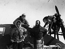 The three scientists manning the station: Ernst Sorge, Fritz Loewe and Johannes Georgi with one of the aerosledges of the expedition. Wegener Expedition-1930 032.jpg