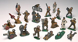 Barclay and Manoil lead toy soldiers and figures, including motorcycle, canons and mortars. World War I Era Toy Soldiers.jpg