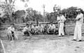 Group of Japanese descendants with Brazilians working resting after tree cutting, to clear areas for coffee plantations in Brazil, '50s and '60s.