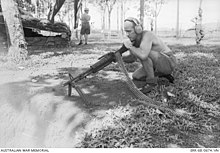 A New Zealand engineer from the Light Aid Detachment of 12th Field Artillery Regiment test-fires a M60 machine gun at Nui Dat, 1968 12th Field Artillery Regiment Light Aid Detachment soldier test-fires an M60 at Nui Dat.jpg