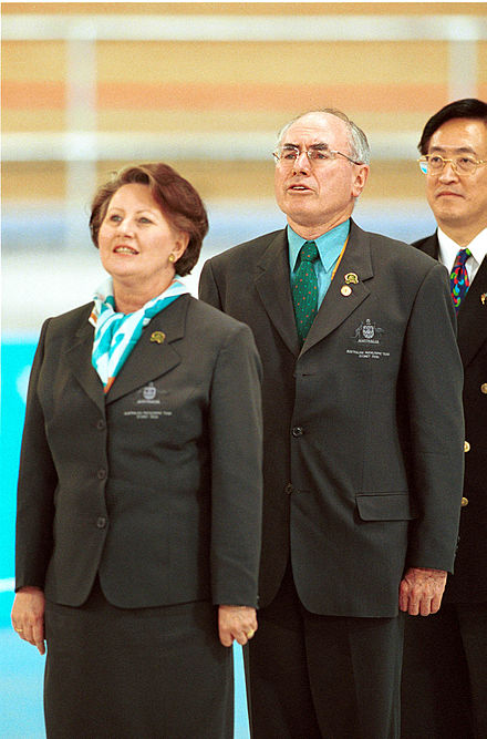 Janette Howard with her husband John Howard in the Australian Team uniform during the 2000 Sydney Paralympic Games. The Howards attended several days of competition during the Games.