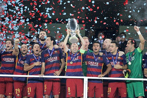 Sandro (second from left) punches the air during the 2015 Super Cup celebrations