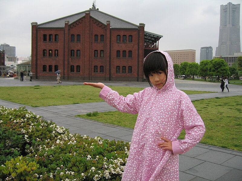 File:A girl sets a pose in front of red brick warehouse, Red Brick Park, Kanagawa, Japan; May 2011.jpg