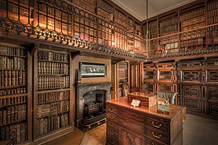 The study at Abbotsford, created for Sir Walter Scott whose novels popularised the Medieval period from which the Gothic Revival drew its inspiration Abbotsford House Study Room.jpg