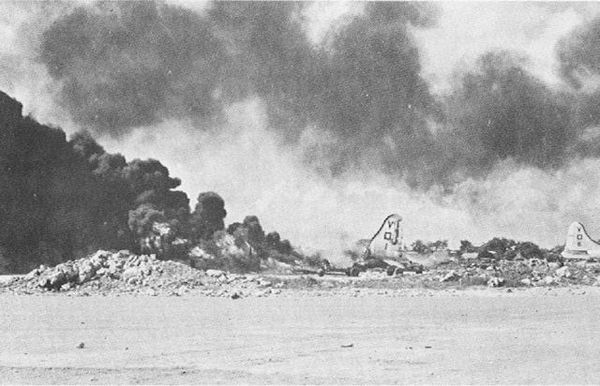 US aircraft burning in the aftermath of the Japanese attack on Isley Field, November 27, 1944