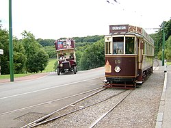 A tram and a bus transporting passengers to various parts of the museum Beamish Transport.JPG