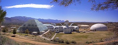 The grounds for Biosphere 2, including a large dome, temple, and several living spaces