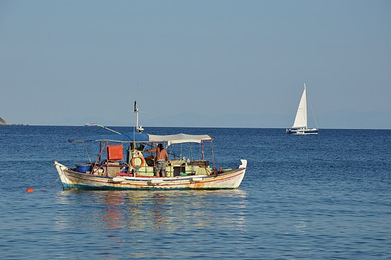 Ships and boats, old and new, small and big, near and far, in the Aegean Sea.