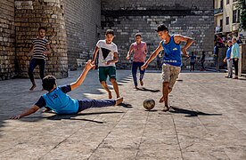 Boys playing street football in Egypt.jpg