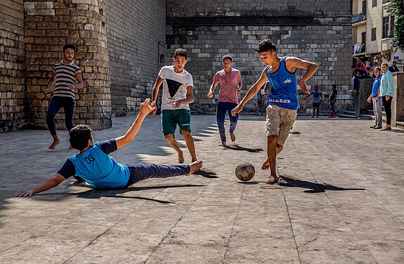 3rd prize: Street football one of the most famous games in Africa and boys playing hard and showing their skills and how talent they are by Mohamed Hozyen Ahmed from Egypt