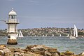 Bradleys Head Light at low-tide, showing the foundation