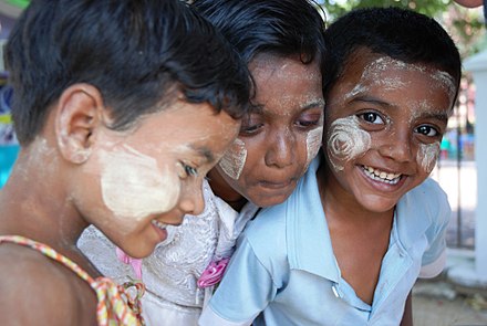 Boys in Yangon with thanaka paste on their faces