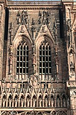 A detail of the windows and galleries of the west front of Strasbourg Cathedral (1215-1439)