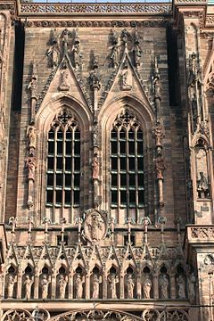 A detail of the windows and galleries of the west front of Strasbourg Cathedral (1215–1439)